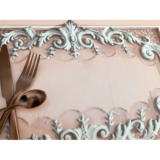 Light pink Haussmann woodworks vinyl placemat